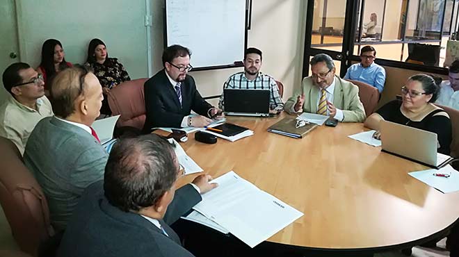 Representantes del Ceaaces y las universidades.